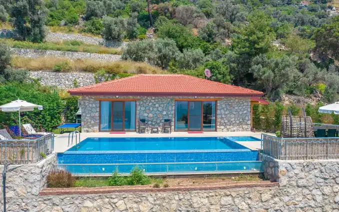 Villa Ahenk is a 2-bedroom sea view holiday villa located in Faralya village of Fethiye- guns